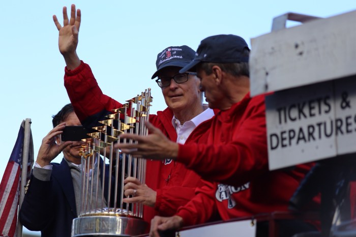 Red Sox Owner John Henry and the World Series Trophy Photo by Ben Thomas @bdthomas 